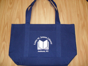 The book bag comes in royal blue canvas with the library's name printed in white.